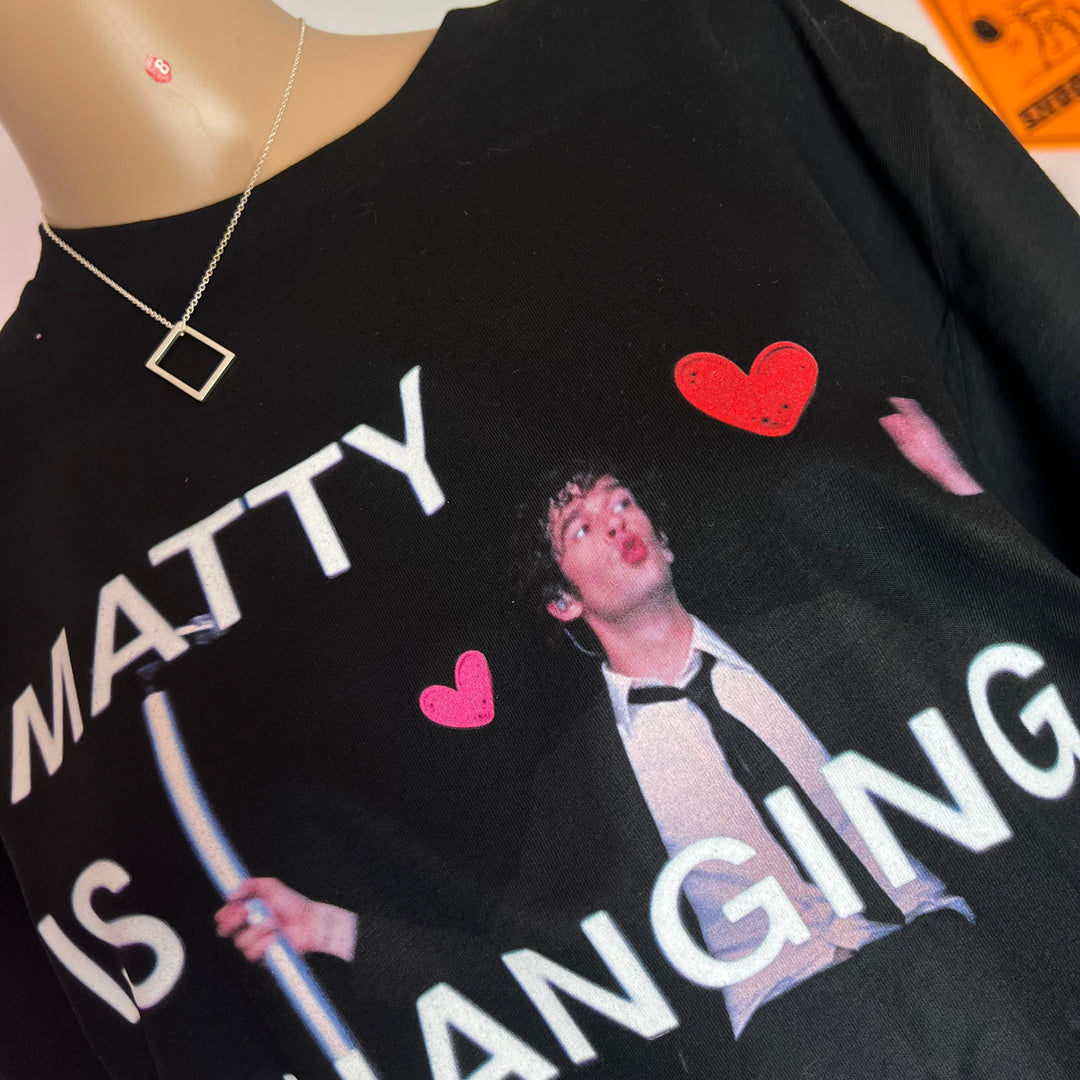 Matty is changing his trousers - graphic t-shirt