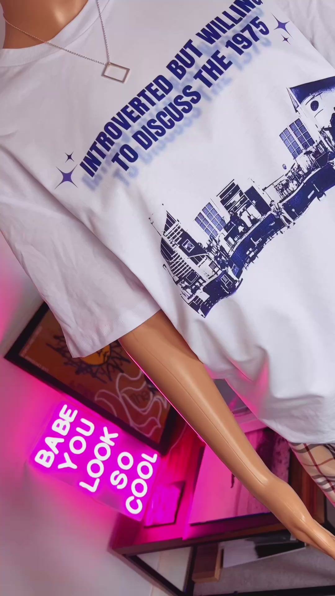 Introverted but willing to discuss the 1975-  print graphic tee